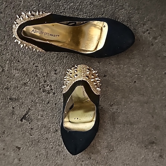 Practically new black swayed heels with gold steads and spikes on the back. - Picture 2 of 3